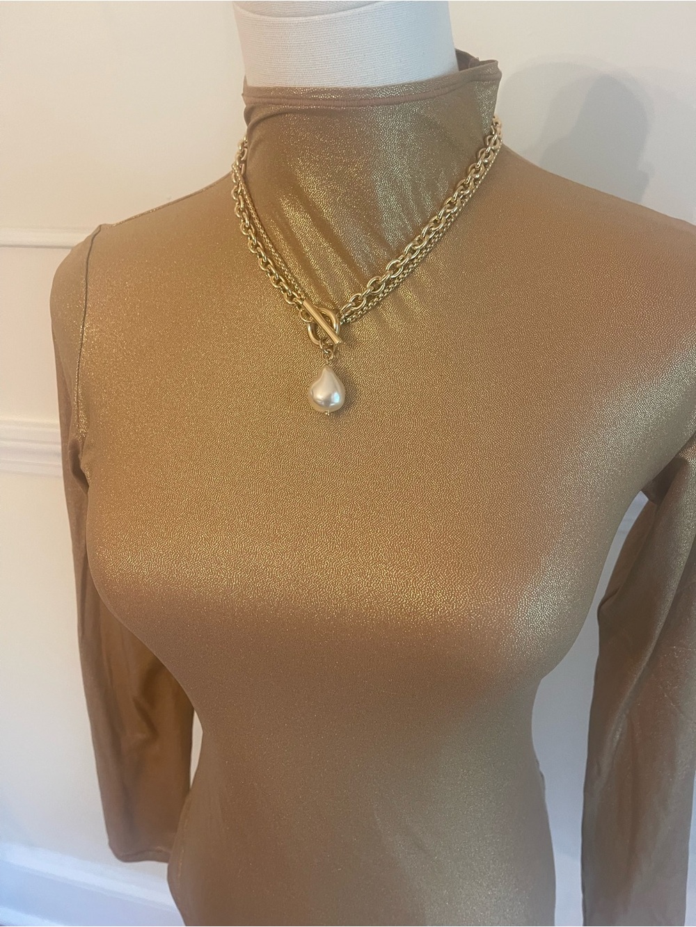 SKIMS Shimmering Feather Light Long Sleeved Gold Turtleneck